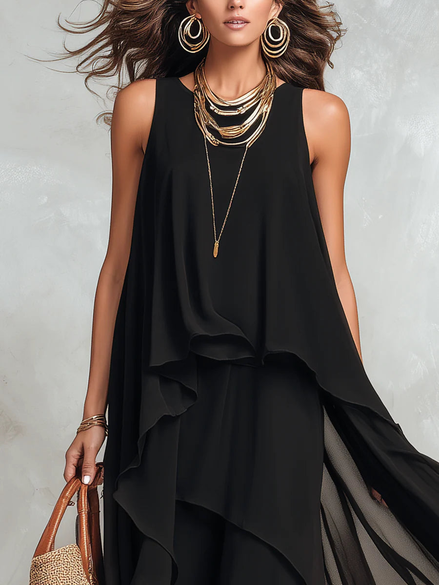 Abito maxi nero in chiffon a balze