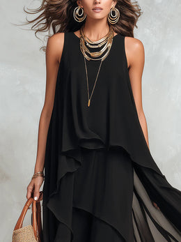 Abito maxi nero in chiffon a balze
