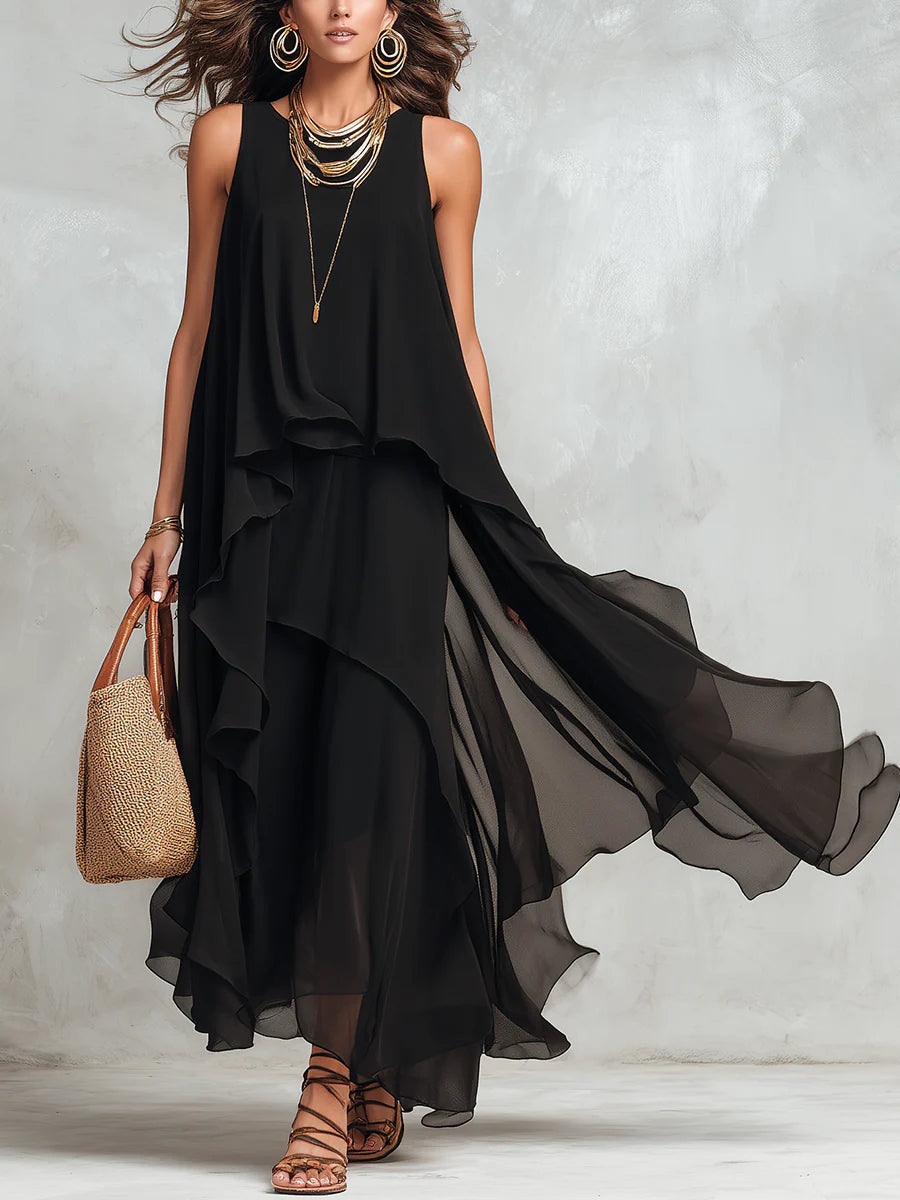 Abito maxi nero in chiffon a balze